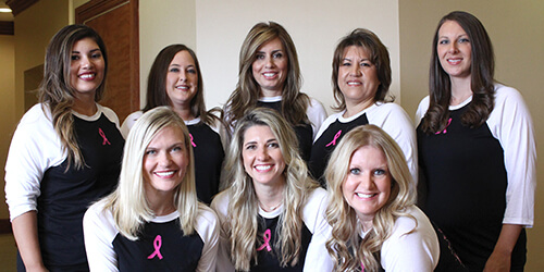 Parkway Vista Dental team in breast cancer awareness shirts